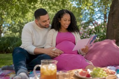Couple supporting each other at prenatal clinic